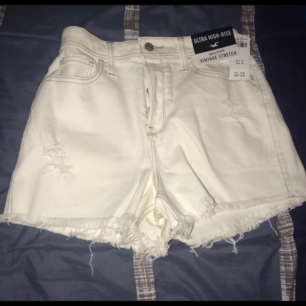 Ultra high rise white ripped shorts